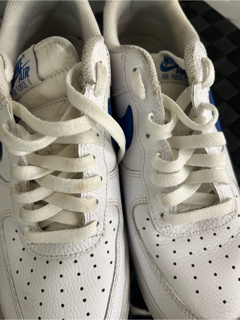 Nike White Sneakers with Blue Swoosh